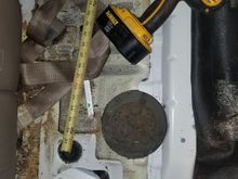 Since everything i do is bymyself crawling around the garage floor i decided i was NOT dropping the gas tank. So i used a 6inch holesaw to get to it instead. Far far eaisier and quicker
 Cureently i sealed the metal edge with a hard set epoxy and then weath stripped a piece of aluminum over it. Pull the carpet back and you would never know it was thier