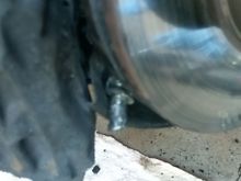 Her husband attempted a brake job, forgot to torque a few things.  A bolt got jammed between the caliper and rotor