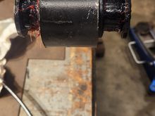 Grease on bushing and inside leaf spring.