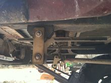 Shackle closest to the camera in the pic above is the full medium leaf pack. 
Shackle in the background has 1 overload leaf and the 3rd leaf from the top removed. Little better angle.