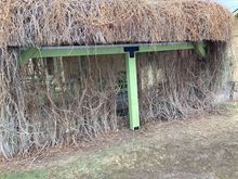This is one of the main support beams for the extra roof along with a support post. They’re both 6 x 8 Doug Firs. Had to take a hedge trimmer to the side just to clear out enough creeper to work.