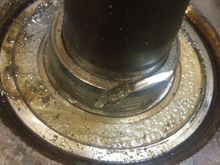 A little cut with the die grinder and a couple of hits on a chisel and the lock ring snaps
