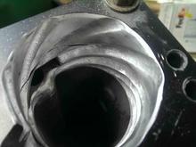 Shot of the LCE Throttle Body Spacer kit.  I used a die grinder with a 1/2" round double cut burr to continue the venturi sweep into the neck or throat of the upper intake plenum.