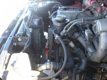 electric fan conversion and custom made power steering line.