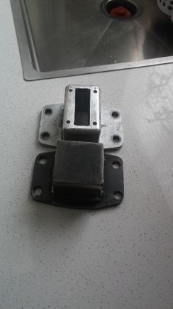 I used the Sky plate as a template to cut my new plate out of 3/16" steel. (You'll see the bottom hole in later pics.) Then for the top cube portion i used 1/8" 2"x2" angle iron. I think they were 1.375". Then. I welded them together like this: L7. And then simply cut a piece of plate to cap it off.