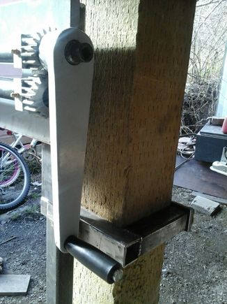 First i took an old torques T50 3/8 drive socket and cut the torque end off. Then I welded it to the shaft that the original handle slides onto. the socket is small enough that the original handle can still slide over it and be used*