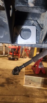 Frame tube jig. Centered between the body mount. Used the body mount to get them close then squared them off the front leaf spring hanger to confirm. Debated using a hole saw but went with a torch for 3 of the 4 holes. Torched the outside frame rail first on passenger and drive side. The inside rail would prevent the torch from catching something on fire while i was on the other side of the frame. Hole saw with a right angle drill was used pass insid frame rail since it is right by the gas line.