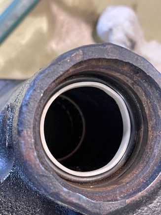 Teflon seal goes inside o-ring.