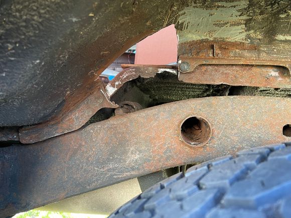 Hole in the wheelwell to patch. I’m happy to see the frame looks good under the goo and dirt.