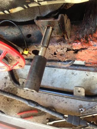 Tapping the hole - drivers side