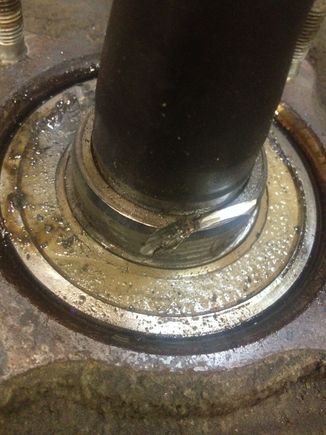 A little cut with the die grinder and a couple of hits on a chisel and the lock ring snaps