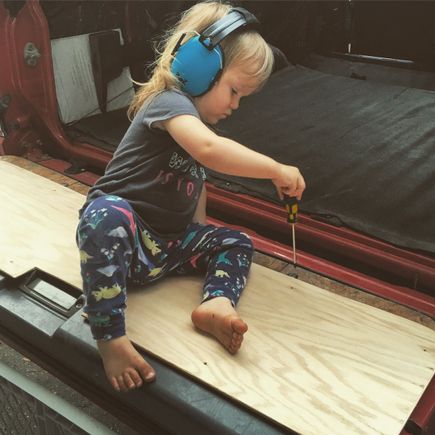 Here's a photo of our 2 year old helping me with the reconstruction of the 4Runner...we're trying to design it for family friendly adventures this time.