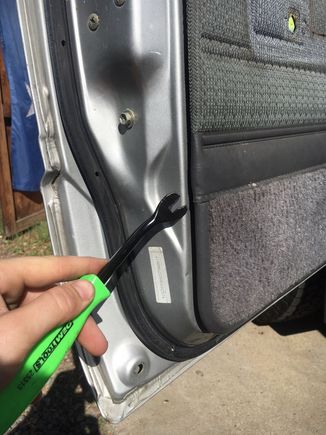 use a flat bar or trim tool so you dont crack your door panels