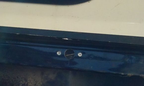 Hole and Dzus spring in bed rail