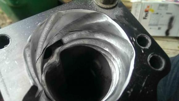 Shot of the LCE Throttle Body Spacer kit.  I used a die grinder with a 1/2" round double cut burr to continue the venturi sweep into the neck or throat of the upper intake plenum.