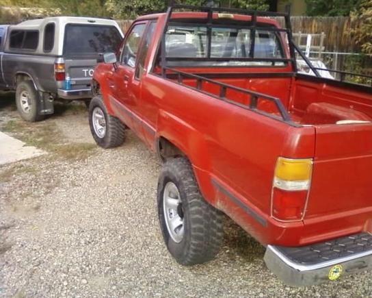 My truck with my grandpas truck in front