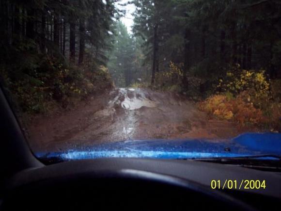 in truck with the tacoma ( trail got a lil rough for stock tacoma )