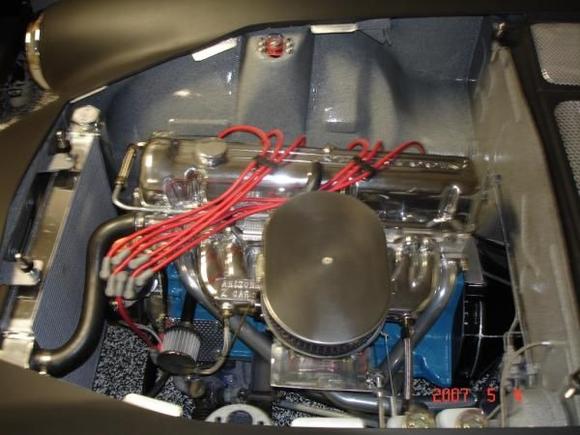 F54 block    040 over
MN47 head w/ large stainless valves
Holley carb
shaved engine comp and battery tray removed