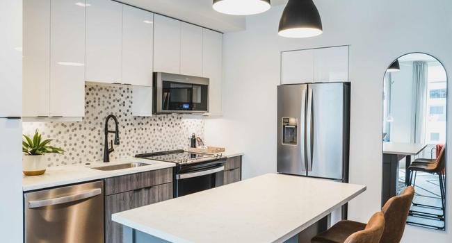 Quartz kitchen countertop with custom 42 inch cabinets